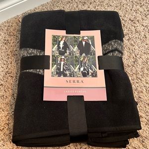 Black and grey ladies poncho